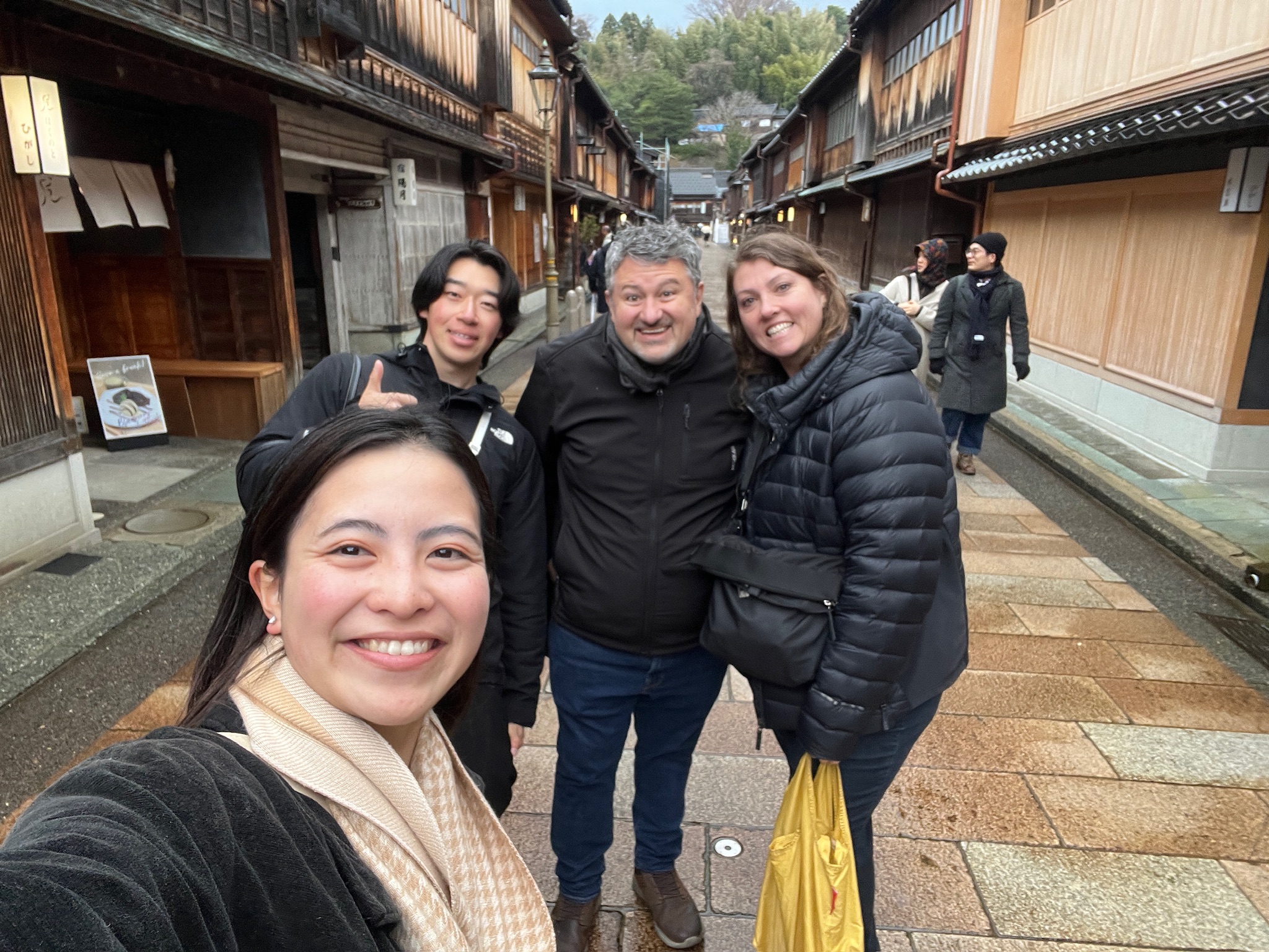 A local guide and guests exploring Kanazawa’s Higashi Chaya geisha district