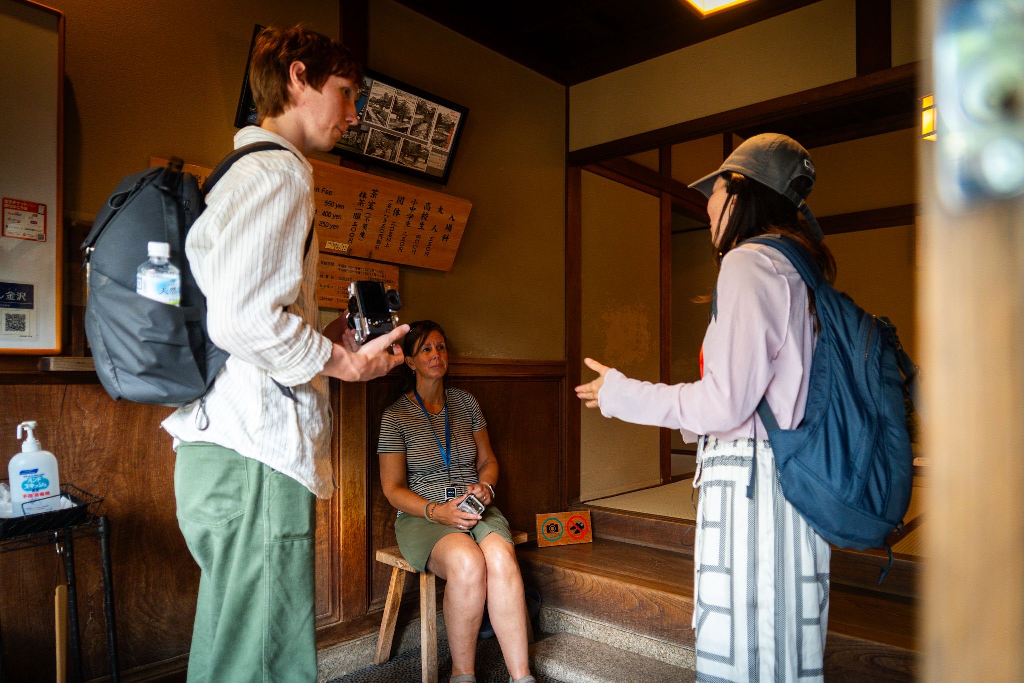 Visitors exploring the interior of a historic Kanazawa residence during a local walking tour