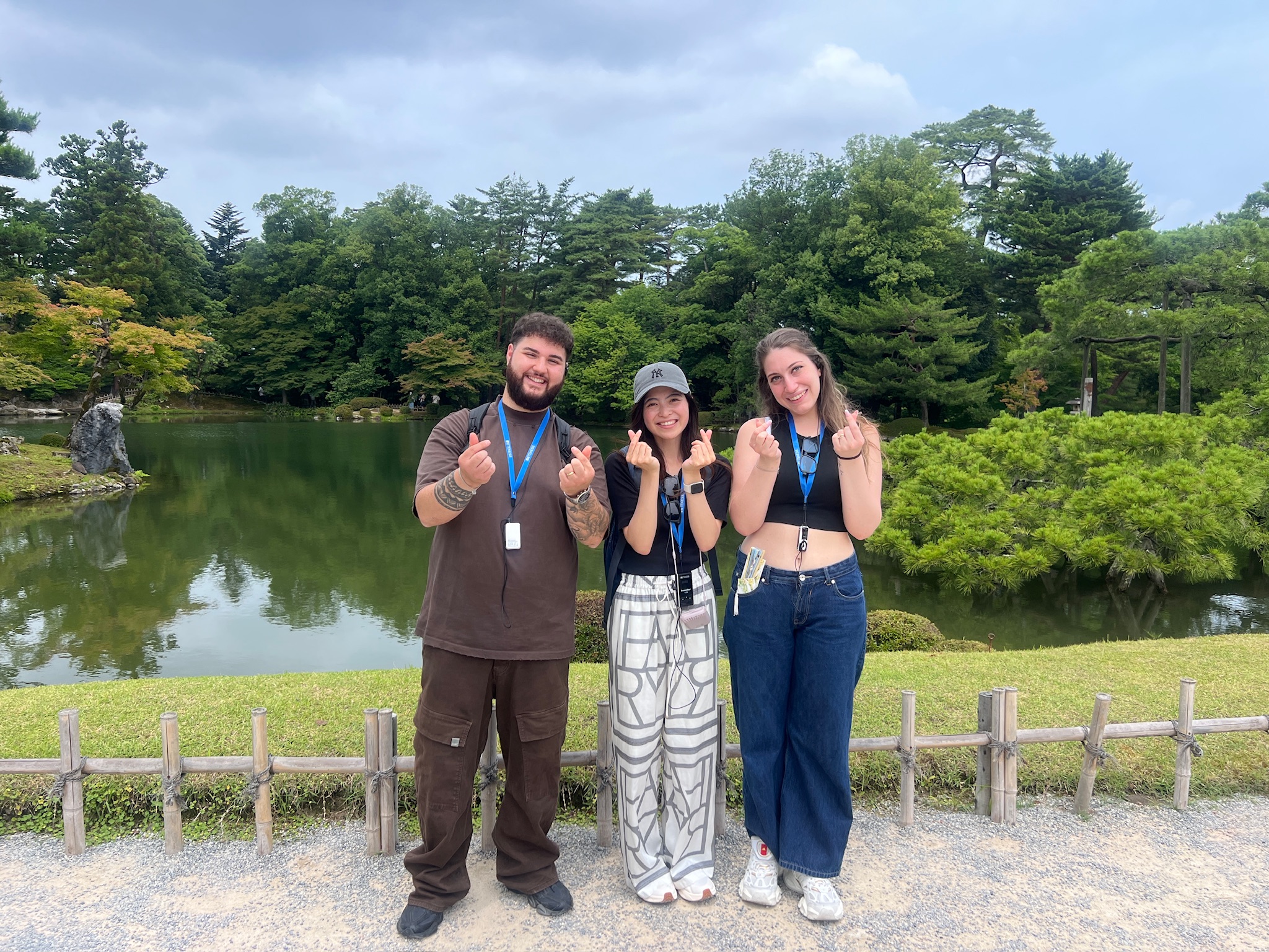 Travelers visiting a garden in Kanazawa